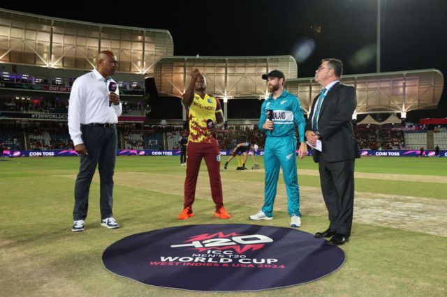 Kane Williamson and Rovman Powell during the toss for West Indies v New Zealand in the T20 World Cup