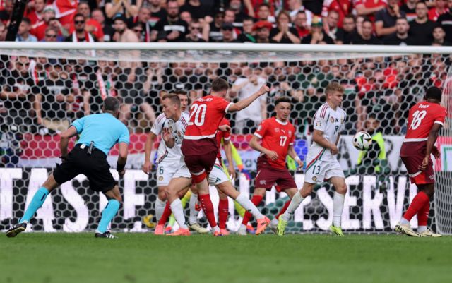 Michel Aebischer of Switzerland scores his team's second goal during the UEFA EURO 2024 group stage match between Hungary and Switzerland at Cologne Stadium