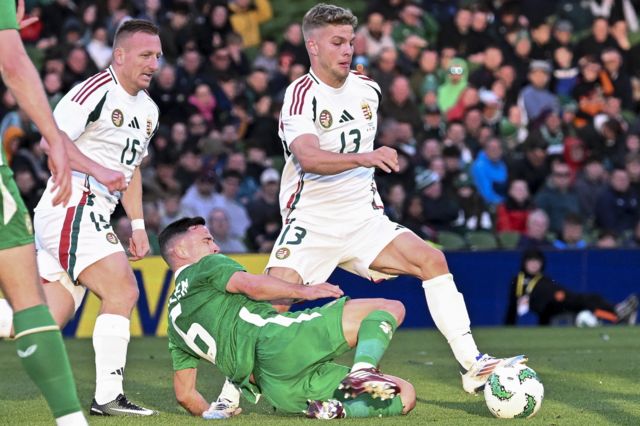 ndras Schaefer (R) and Laszlo Kleinheisler (R) of Hungary in action against Josh Cullen of Ireland during the international friendly soccer match between Ireland and Hungary in Dublin