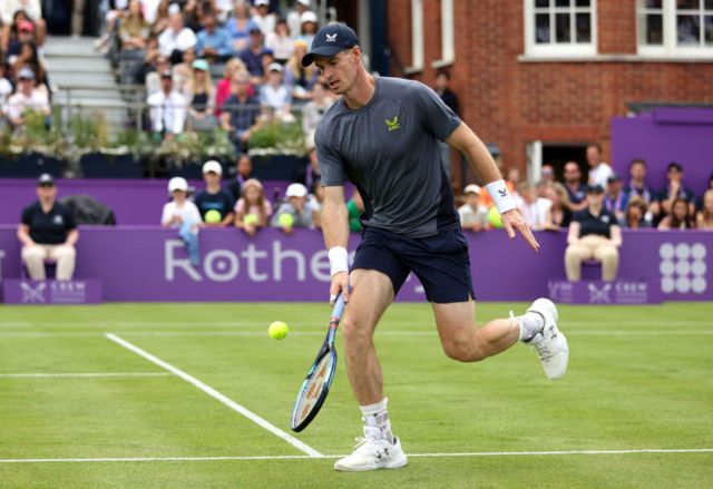 Andy Murray chases a ball at Queen's