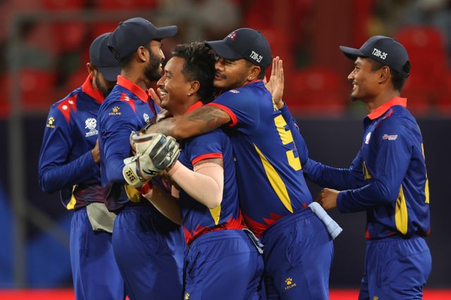 Sompal Kami of Nepal celebrates with teammates after dismissing Tanzid Hasan of Bangladesh (not pictured) during the ICC Men's T20 Cricket World Cup West Indies & USA 2024 match