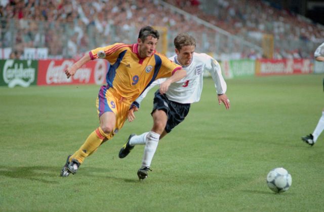 Phil Neville and Viorel Moldovan playing at Euro 2000