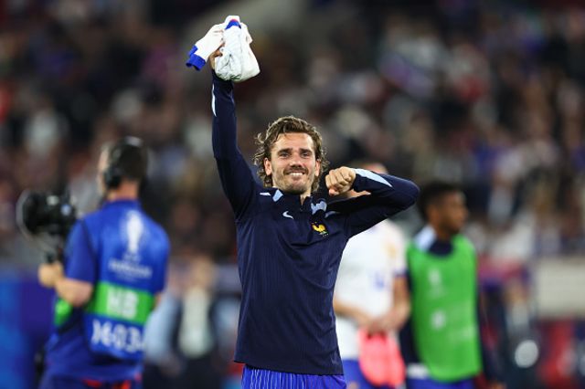 : Antoine Griezmann of France celebrates victory