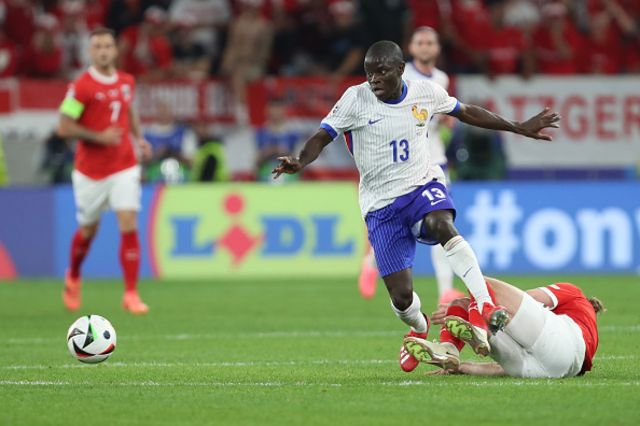 N´Golo Kante of France and Marcel Sabitzer of Austria battle for the ball