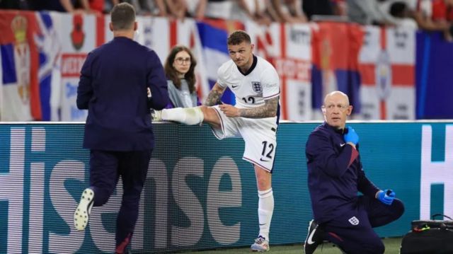 Keiran Trippier is treated for cramp