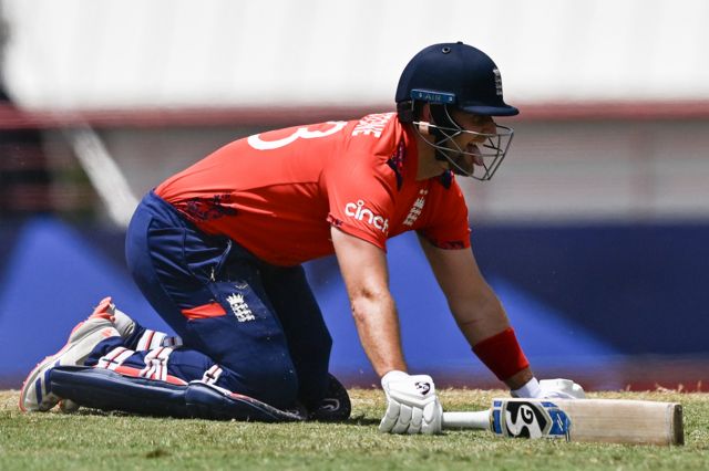 Liam Livingstone dives to make his ground