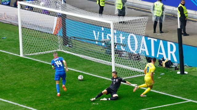 Roman Yaremchuk scores for Ukraine against Slovakia at Euro 2024