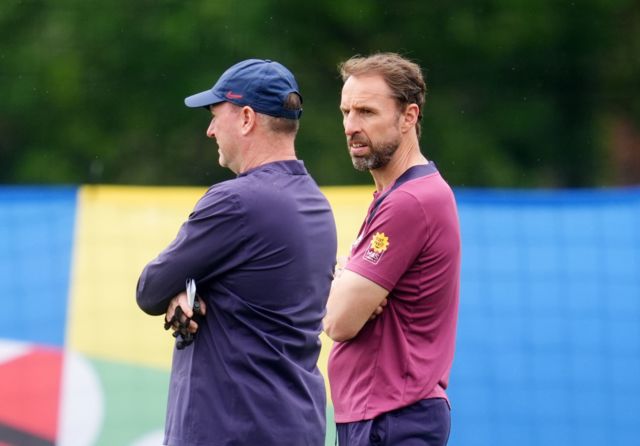 England manager Gareth Southgate talks to coach Steve Holland