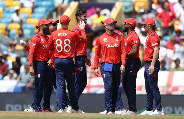 England and Reece Topley celebrates the wicket of Andries Gous