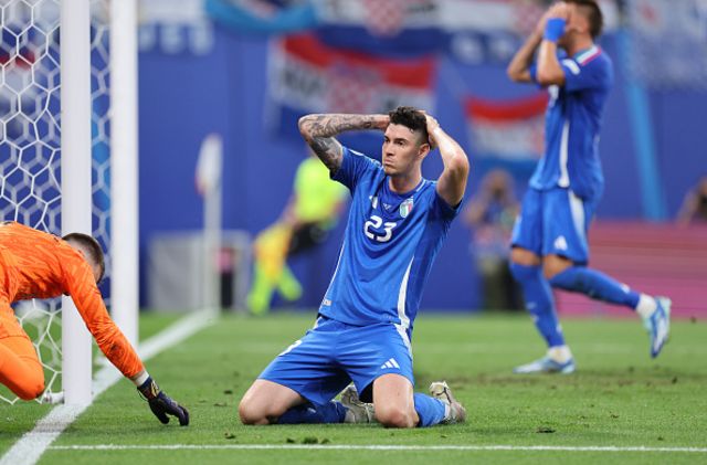Alessandro Bastoni of Italy reacts after a missed chance