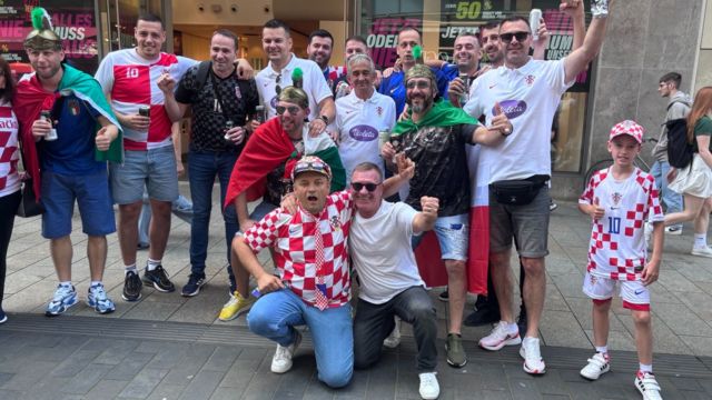 Fans pose for a photo in Leipzig