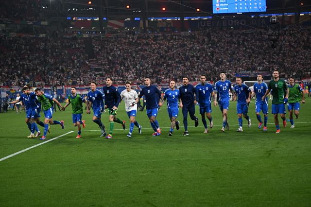 Players of Italy celebrate