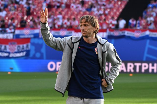Modric waves to fans