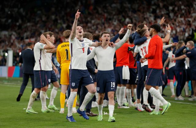 Declan Rice and Phil Foden celebrate England's Euro 2020 semi-final victory over Denmark