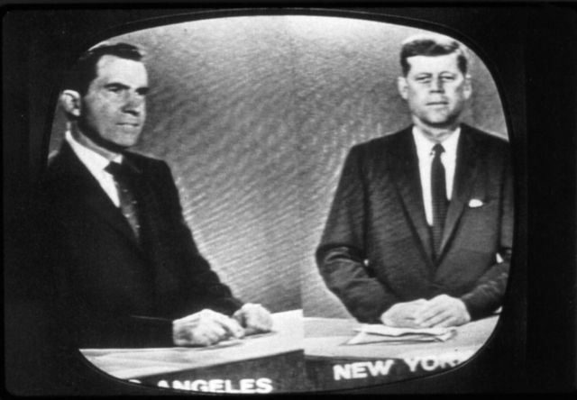 Split screen of Richard Nixon and John F Kennedy on a television screen.