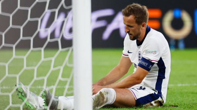 Harry Kane sits no the floor during an England game at the Euros