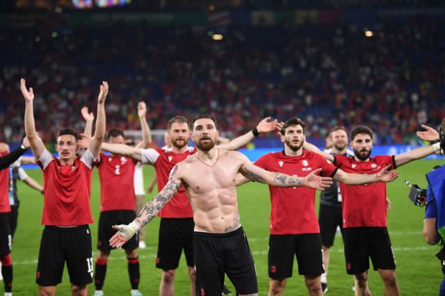 Georgia players celebrate beating Portugal