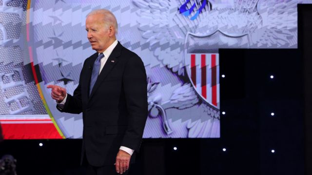 President Joe Biden takes the debate stage in Atlanta