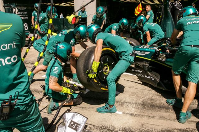 Aston Martin change tyres during practice in Austria