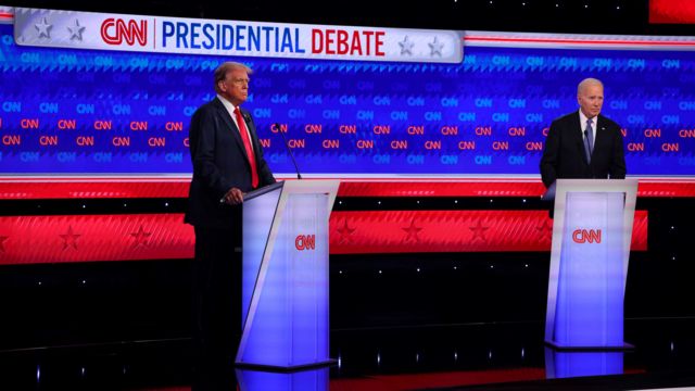 Donald Trump (left) and President Joe Biden (right) are photographed on the debate stage in Atlanta