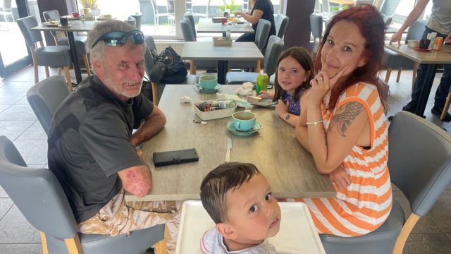Mark Barnes sat with his daughter Tracey and his two grandchildren at a table