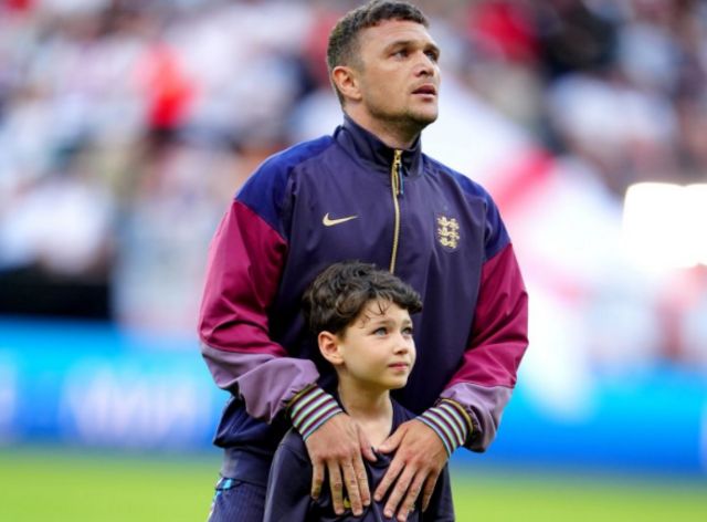 Kieran Trippier and son Jacob on the pitch ahead of a international friendly at St. James' Park, Newcastle.
