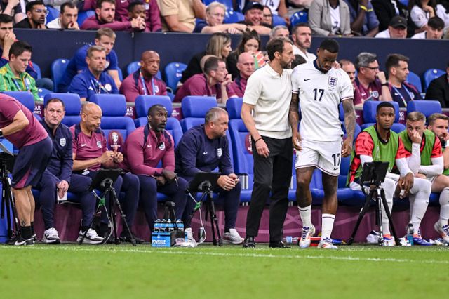 Head coach Gareth Southgate of England and Ivan Toney of England looks on