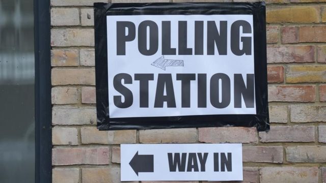 Polling station sign showing the entrance