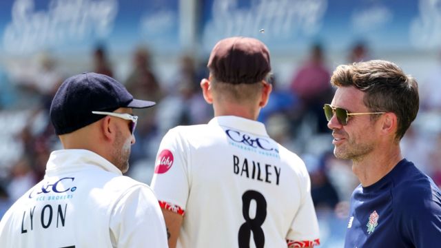 Nathan Lyon and Jimmy Anderson talk during Lancashire's trip to Canterbury to play Kent