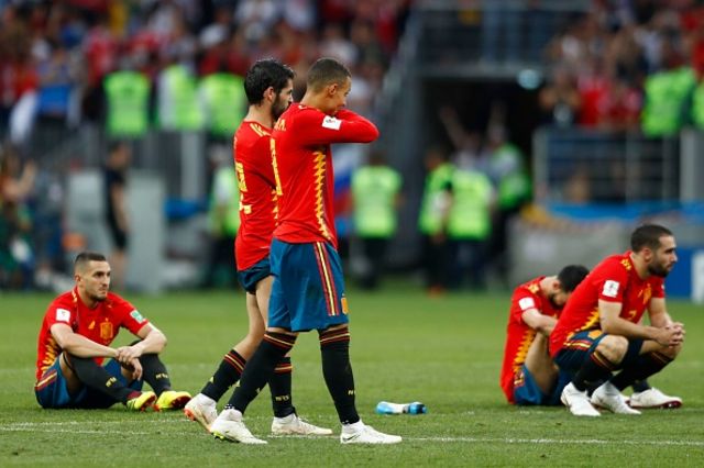 Players of Spain react after losing the penalty shoot-out during the 2018 FIFA World Cup Russia Round of 16