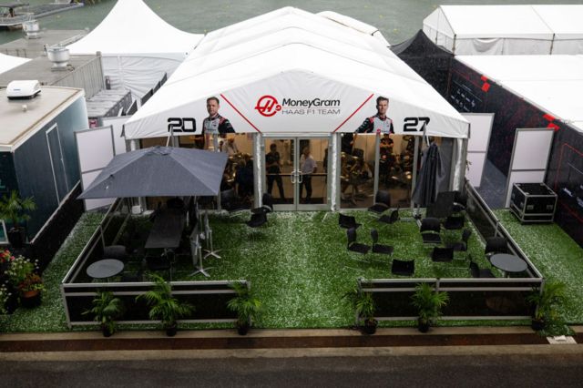 Haas garage with hailstorms outside