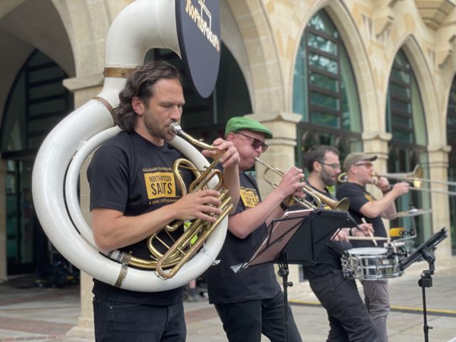 A band performing at the Guildhall in Northampton for the Saints celebratory parade