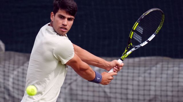 Carlos Alcaraz practises at Wimbledon