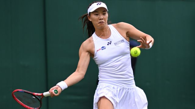 Lily Miyazaki strikes the ball with her right hand
