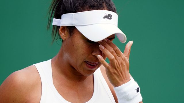 Heather Watson wipes her face