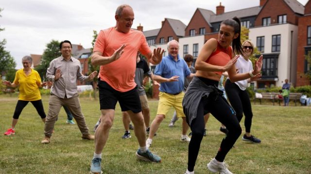 British leader of the Liberal Democrats party Ed Davey participates in a Zumba class with supporters during a Liberal Democrats general election campaign event in Wokingham, Britain, July 1, 2024