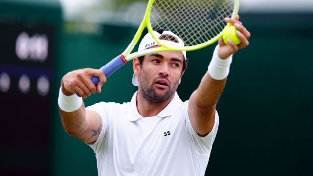Matteo Berrettini serves at Wimbledon