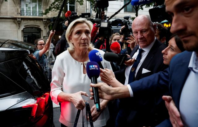 Marine Le Pen, member of parliament and French far-right National Rally (Rassemblement National - RN) party leader, arrives at the RN party headquarters in Paris