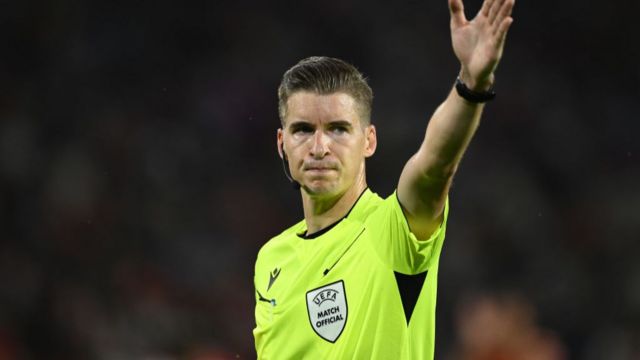 Referee Francois Letexier signals during the Euro 2024 game between Spain and Georgia