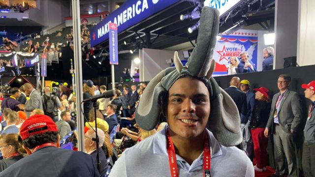 The young delegates in an elephant hat