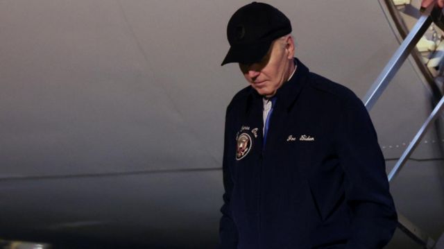 Joe Biden descends the steps of Air Force One