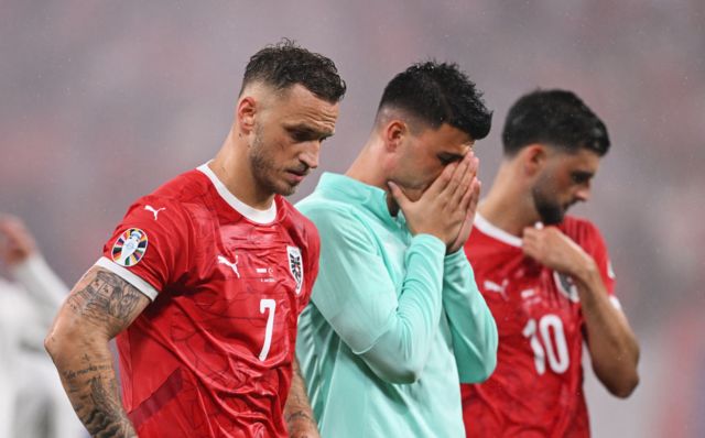 Austria players dejected