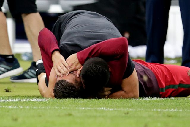 Cristiano Ronaldo is consoled at the final whistle