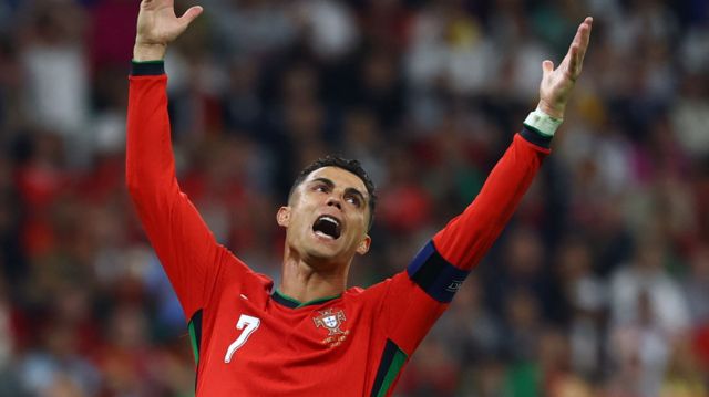 Cristiano Ronaldo with his arms in the air in frustration during Portugal's Euro 2024 win over Slovenia