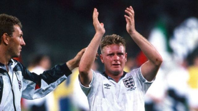 Paul Gascoigne is comforted by team-mate Terry Butcher after England lose the 1990 World Cup semi-final