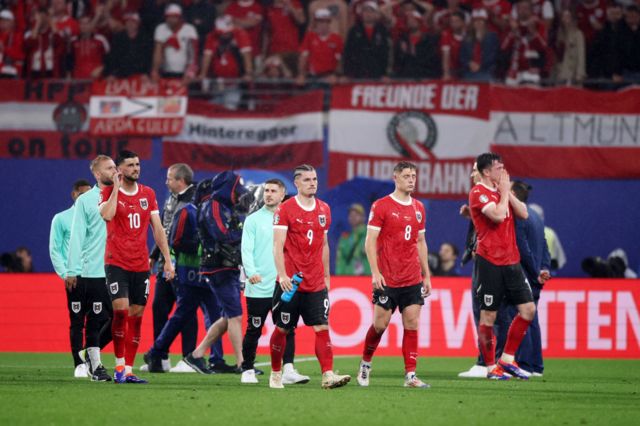 Austria players look dejected