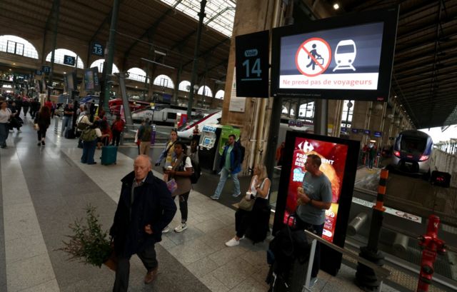 Passengers are pictured at Gare du Nord station after threats against France's high-speed TGV network, ahead of the Paris 2024 Olympics opening ceremony