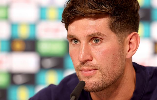 John Stones of England talks to the media during a press conference