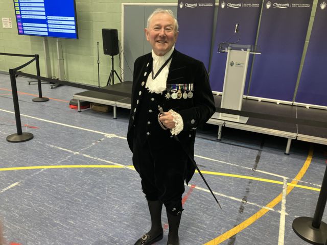 James McNamara wearing traditional sheriff dress - and carrying a sword