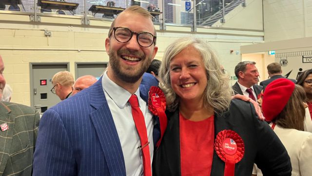 Labour's Heidi Alexander and Will Stone smiling with arms around each other